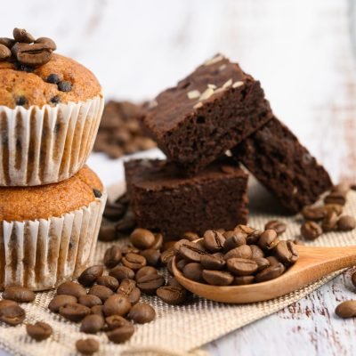 Banana cupcakes mixed with chocolate chip on a white plate.