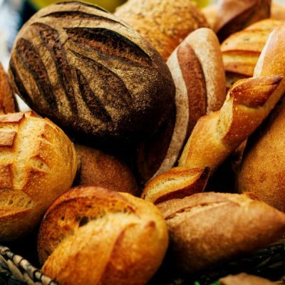 bunch of bread loafs on the table